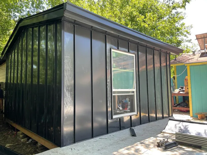 Black standing seam metal wall panels for Roof Inspection in Jeannette